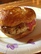 Venison Pork Sausage with Pickled Onions on Bretzel Roll